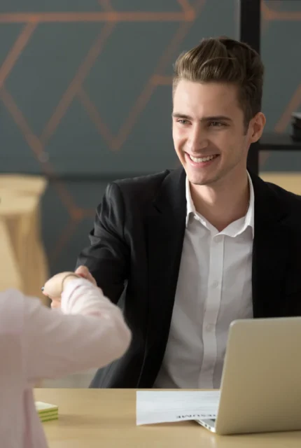 smiling-hr-employer-handshaking-successful-job-applicant-hiring-greeting