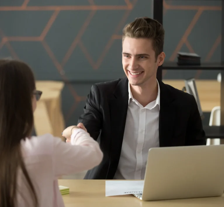 smiling-hr-employer-handshaking-successful-job-applicant-hiring-greeting